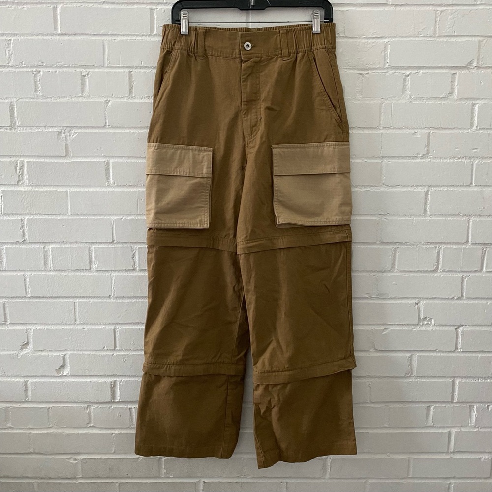 PUMA x PERKS AND MINI Unisex Pants. Detachable pants  feature a cargo pocket.